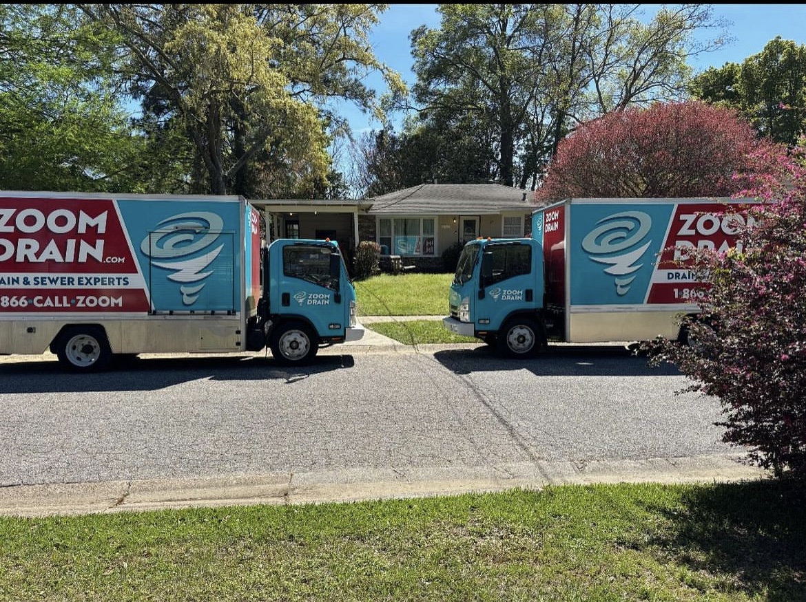 Image of Trucks in front of home