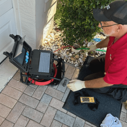 man draining a drain 